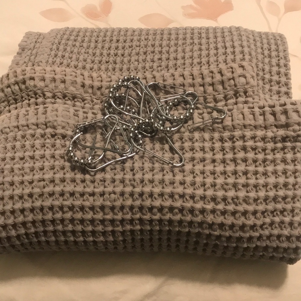 Gray shower curtain with hooks